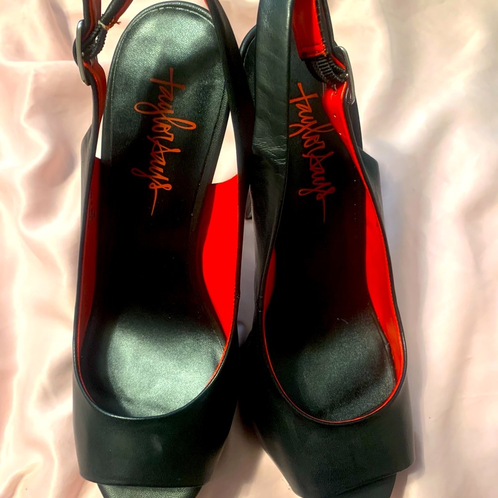 Taylor Says Glenda in black
